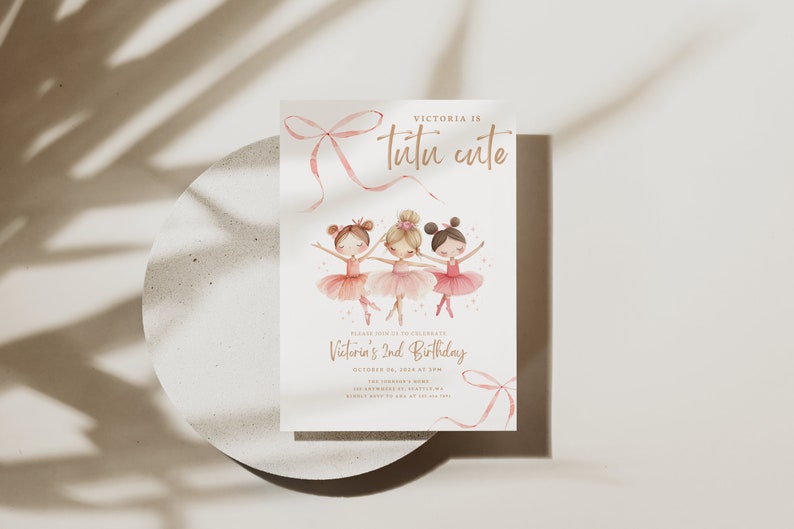 May include: A pink and gold invitation card with a watercolor illustration of three ballerinas. The text reads "Victoria is tutu cute" and "Please join us to celebrate Victoria's 2nd Birthday".