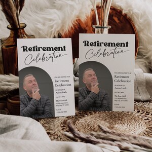 May include: Two white cards with black text announcing a retirement celebration for Aaron Loeb. The cards feature a photo of the retiree and include the date, location, and RSVP information.