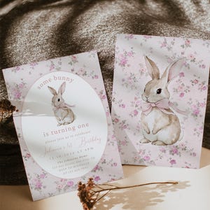 May include: A pink and white floral invitation with a watercolor illustration of a bunny rabbit. The invitation reads "some bunny is turning one" and includes details for a birthday party.
