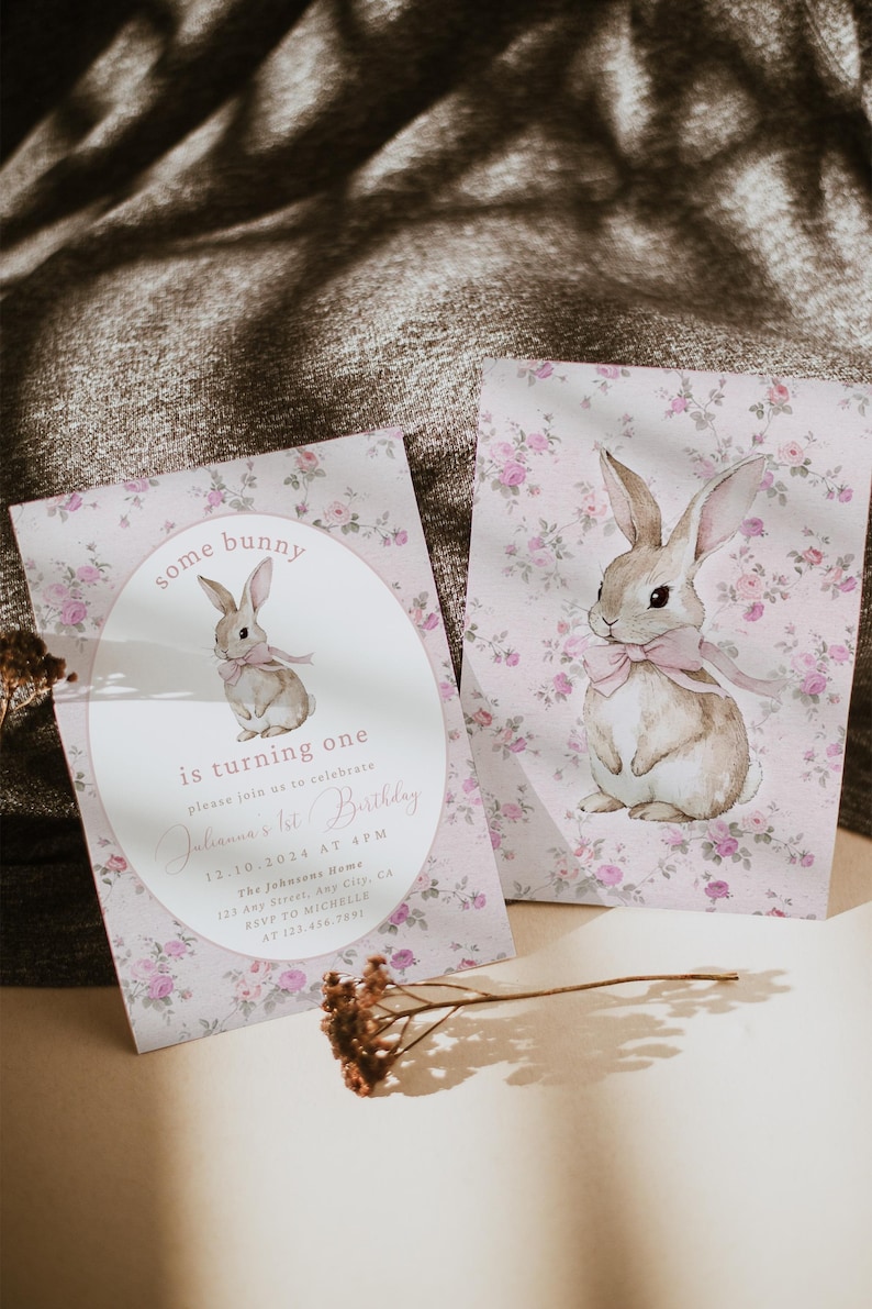 May include: A pink and white floral invitation with a watercolor illustration of a bunny rabbit. The invitation reads "some bunny is turning one" and includes details for a birthday party.