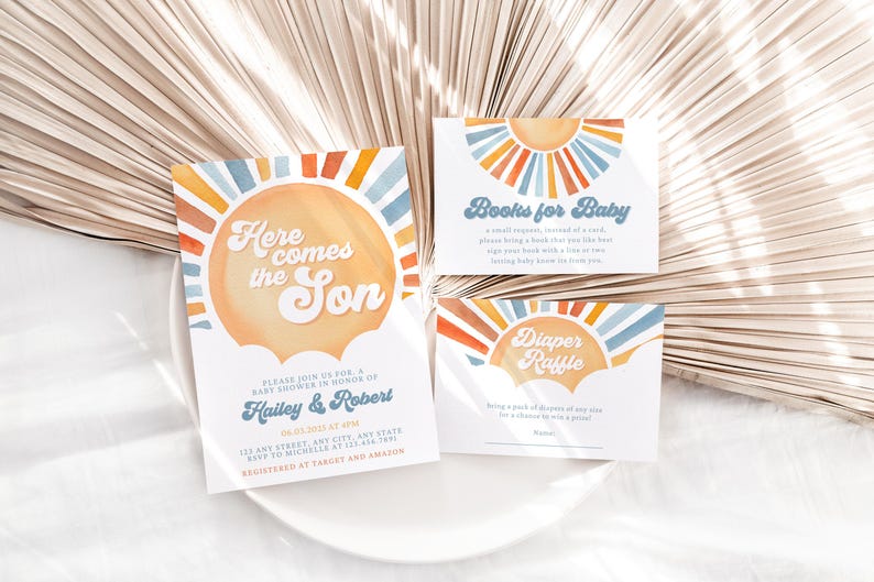 May include: A set of three baby shower cards with a sunburst design in shades of blue, orange, and yellow. The cards feature the text "Here comes the Son", "Books for Baby", and "Diaper Raffle".