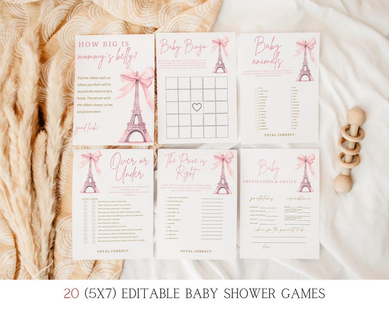 May include: Twenty printable baby shower game cards featuring a pink and white Eiffel Tower design. The games include "How Big is Mommy's Belly?", "Baby Bingo", "Over or Under", "The Price is Right", "Baby Animals", and "Baby Predictions & Advice".