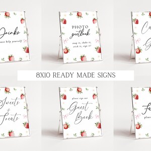 May include: Set of six 8x10 inch printable signs with a strawberry theme. The signs feature text such as "Drinks", "Photo Guestbook", "Cards & Gifts", "Sweets & Treats", "Guest Book", and "Favors".