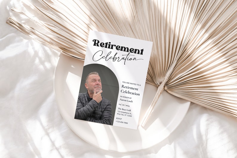 May include: A white card with black text announcing a retirement celebration for Aaron Loch. The card includes the date, time, location, and RSVP information. A photo of Aaron Loch is in the background.