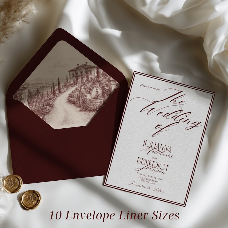 May include: A deep burgundy envelope with a custom liner featuring a detailed sketch of an Italian villa and landscape, paired with a white wedding invitation card with burgundy text and a matching border, plus two gold wax seals.