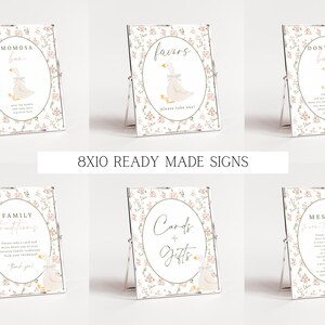 May include: Set of 8x10 inch printable signs for a baby shower. The signs feature a floral design with a goose illustration and text that says "Don't Say Baby", "Family Welcome", "Cards & Gifts", "Message to the Goose", "Favors", and "Mimosa Bar".