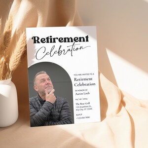 May include: A white invitation card with black text announcing a retirement celebration for Aaron Loeb on April 20, 2024 at The Bear Grill. The invitation includes the restaurant's address and an RSVP number.