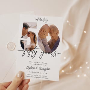 May include: A white invitation card with black text announcing a 50th anniversary celebration. The number 50 is cut out of the card and replaced with a photo of a couple. The text reads "celebrating fifty years" and includes the couple's names, date, time, and location.