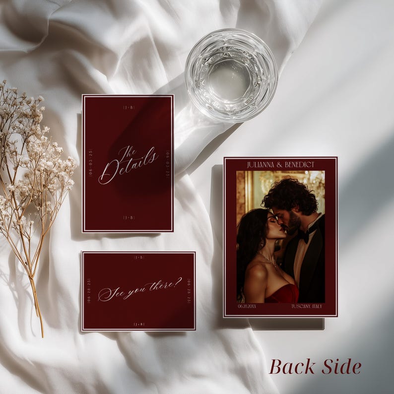 May include: A set of three rectangular wedding stationery cards in deep burgundy with white borders. One card features a photograph of a couple with the text Julianna & Benedict. Another card displays the text The Details, and the third says See you there?