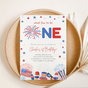 May include: A red, white, and blue invitation for a first birthday party. The invitation features a large number "ONE" with fireworks and stars. The text reads "what fun to be ONE. Please join us to celebrate Charlie's 1st Birthday! Saturday, July 4th, 2024 four o'clock in the afternoon 123 Anywhere st., Any City, St 12345 rsvp to Sophia at 123-456-7891"