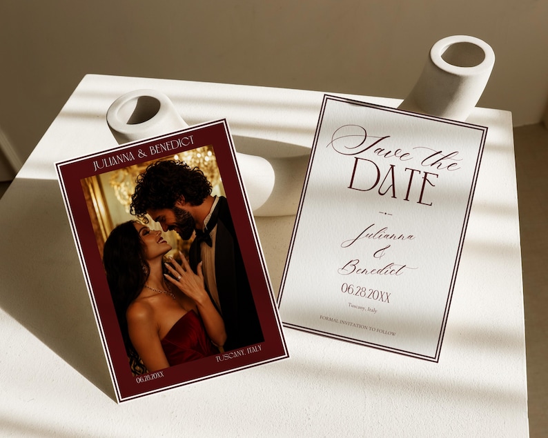 May include: A rectangular Save the Date card and a photo card with a deep red border. The photo card features a couple and the text Julianna & Benedict, Tuscany, Italy, 06.28.20XX. The Save the Date card displays the text Save the Date, Julianna & Benedict, 06.28.20XX, Tuscany, Italy, and Formal invitation to follow.