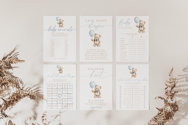 May include: A set of six baby shower game cards featuring a cute teddy bear holding a blue balloon. The games include "Baby Animals", "Late Night Diapers", "Baby Alphabetize", "Find the Good Bingo", "Pacifier Hunt", and "What's in the Baby's Diaper".