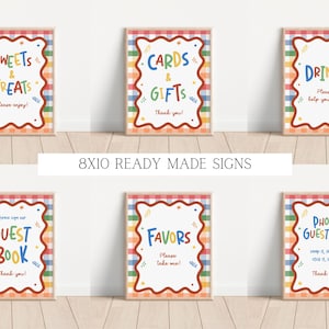 Puede incluir: Seis letreros rectangulares con un borde de cuadros arco&iacute;ris y un marco rojo ondulado. Los letreros presentan texto colorido: Sweets & Treats, Cards & Gifts, Drinks, Guest Book, Favors y Photo Guestbook, cada uno con texto instructivo.