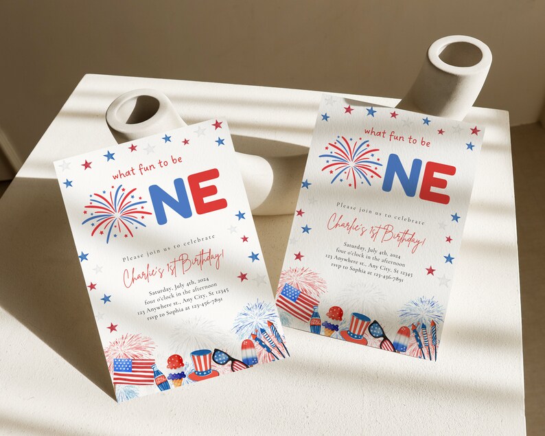 May include: Two red, white, and blue birthday party invitations with a fireworks theme. The invitations say "What fun to be one!" and "Please join us to celebrate Charlie's 1st Birthday!"