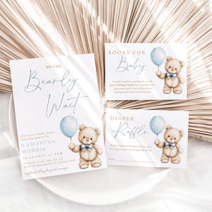 May include: Three baby shower cards with a teddy bear holding a blue balloon. The cards are for a diaper raffle, books for baby, and a baby shower invitation that says "We Can Bearly Wait".