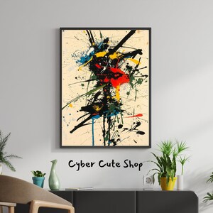 Puede incluir: Impresión de arte abstracto con marco negro. La obra presenta un fondo beige con salpicaduras de pintura coloridas en rojo, amarillo, azul y verde. El texto "Cyber Cute Shop" es visible en la parte inferior.