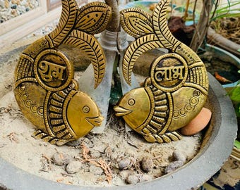 elegance and symbolism to your space with this beautifully handcrafted brass fish.