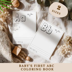 Puede incluir: Dos páginas de libro para colorear blancas con las letras "Aa" y "Bb" en negrita y delineadas. El texto "is for" está escrito en cursiva. La frase "Made with love by" está en la parte inferior. El texto "BABY'S FIRST ABC COLORING BOOK" está en la parte inferior.