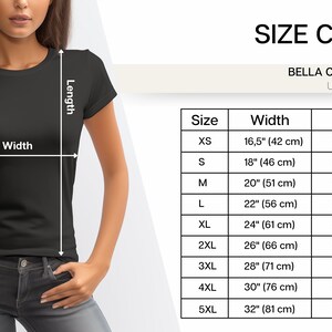 Peut inclure: Tableau des tailles pour les t-shirts unisexes Bella Canvas 3001. Le tableau indique les mesures de largeur et de longueur en pouces et en centim&egrave;tres pour les tailles XS &agrave; 5XL.