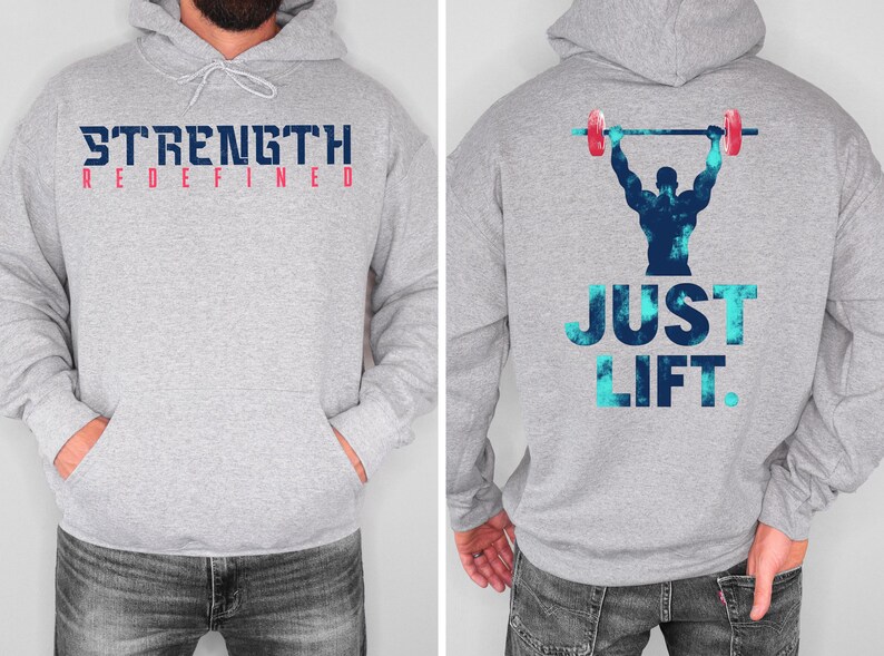 May include: Gray hooded sweatshirt with the text "STRENGTH REDEFINED" on the front and a blue and white graphic of a person lifting weights with the text "JUST LIFT." on the back.