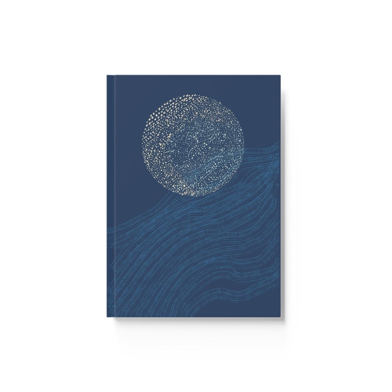 Sketchbook with abstract design in blue and yellow on the cover