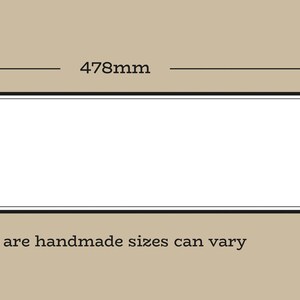 May include: A white sign with a pointed end, measuring 478mm wide and 115mm high.  *As these signs are handmade sizes can vary*