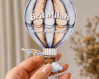 Recuerdos personalizados de globos aerostáticos, ideales para baby showers, bautizos, con opción de almendras vacías o confitadas. Recuerdos para fiestas.