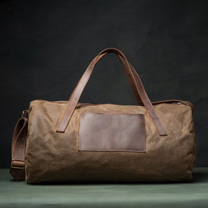 Waxed Canvas Duffel Bag with leather straps and big front pocket