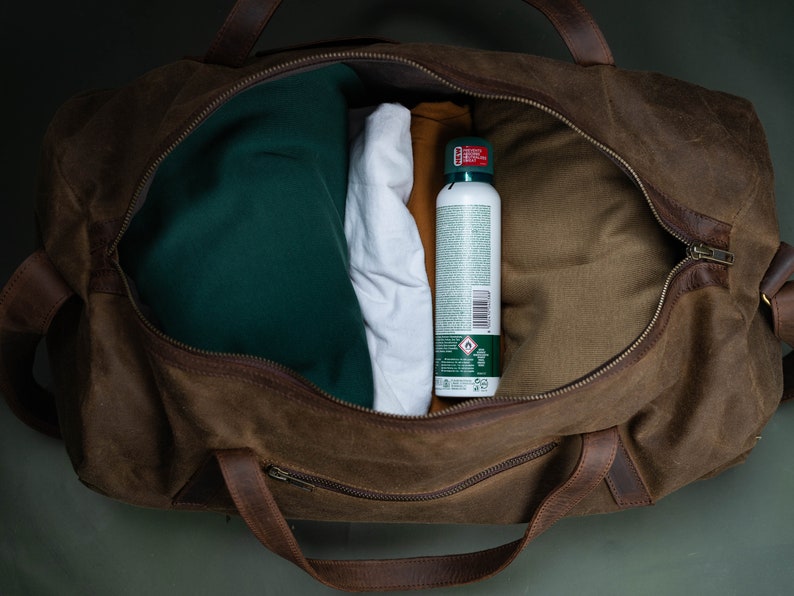 Gym bag opened with clothes inside