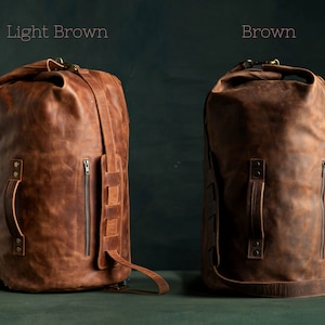 Two Duffel Bags made of leather in Light Brown and Brown