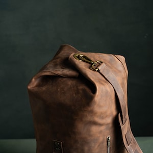 Closed Duffel Bag with brass hooks