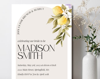 May include: A lemon-themed bridal shower invitation with a watercolor illustration of lemons, leaves, and flowers. The invitation reads "Join us for brunch & bubbly celebrating our bride to be Madison Smith Saturday, May 3rd, 2023 at eleven o'clock 2222 Main Street, Springfield, MA Kindly RSVP to Jen by April 20th Registered at Pottery Barn"