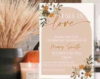 Pode incluir: Um convite de casamento com tema de outono com ilustrações florais. O convite apresenta o texto "Fall in love" em uma fonte de escrita e o nome da noiva, Mary Smith. A data do casamento é 12 de outubro de 2023 às 14h00. O convite também inclui o endereço do local do casamento, 1234 Main Street, Springfield MA, e um pedido de RSVP para Jen até 15 de setembro. O convite está registrado na Crate and Barrel.