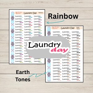 May include: Two sheets of laundry day stickers in rainbow and earth tone color schemes. The stickers have the words "Laundry Day" in various fonts and colors. The word "Laundry Day" is also in a pink oval.