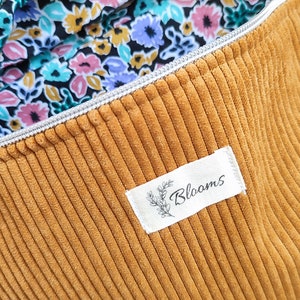 Women's corduroy fanny pack, trendy and practical bag. Interior flowers. moutarde