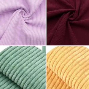 May include: Four swatches of corduroy fabric in various colors. The top left is a light purple, the top right is a deep burgundy, the bottom left is a muted green, and the bottom right is a golden yellow. The fabric has a ribbed texture.