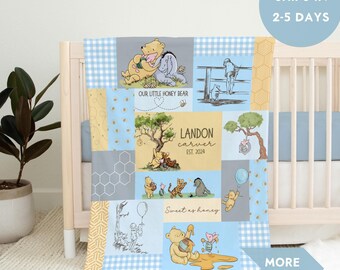 May include: A blue and yellow patchwork baby quilt featuring Winnie the Pooh and his friends. The quilt has a personalized name, Landon Carver, and the text "Our Little Honey Bear" and "Sweet as Honey".