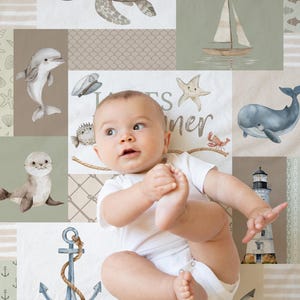 May include: A baby is lying on a white and brown play mat with a nautical theme. The mat features a variety of sea creatures, including a turtle, a dolphin, a whale, a starfish, a crab, a seahorse, and an anchor. The text "Little Summer" is printed on the mat.