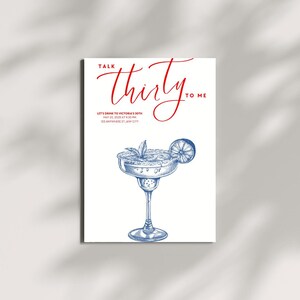 May include: A white invitation card with the text "Talk Thirty to Me" in red script. Below, a blue and white illustration of a margarita cocktail is featured. The invitation includes event details: "Let's drink to Victoria's 30th" and the date and time.