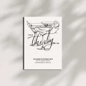 May include: A white invitation card with a black sketch of three martini glasses. The text "Talk Thirsty to Me" is written in a cursive font. The invitation reads "Let's Drink to Victoria's 30th" with date, time, and address.