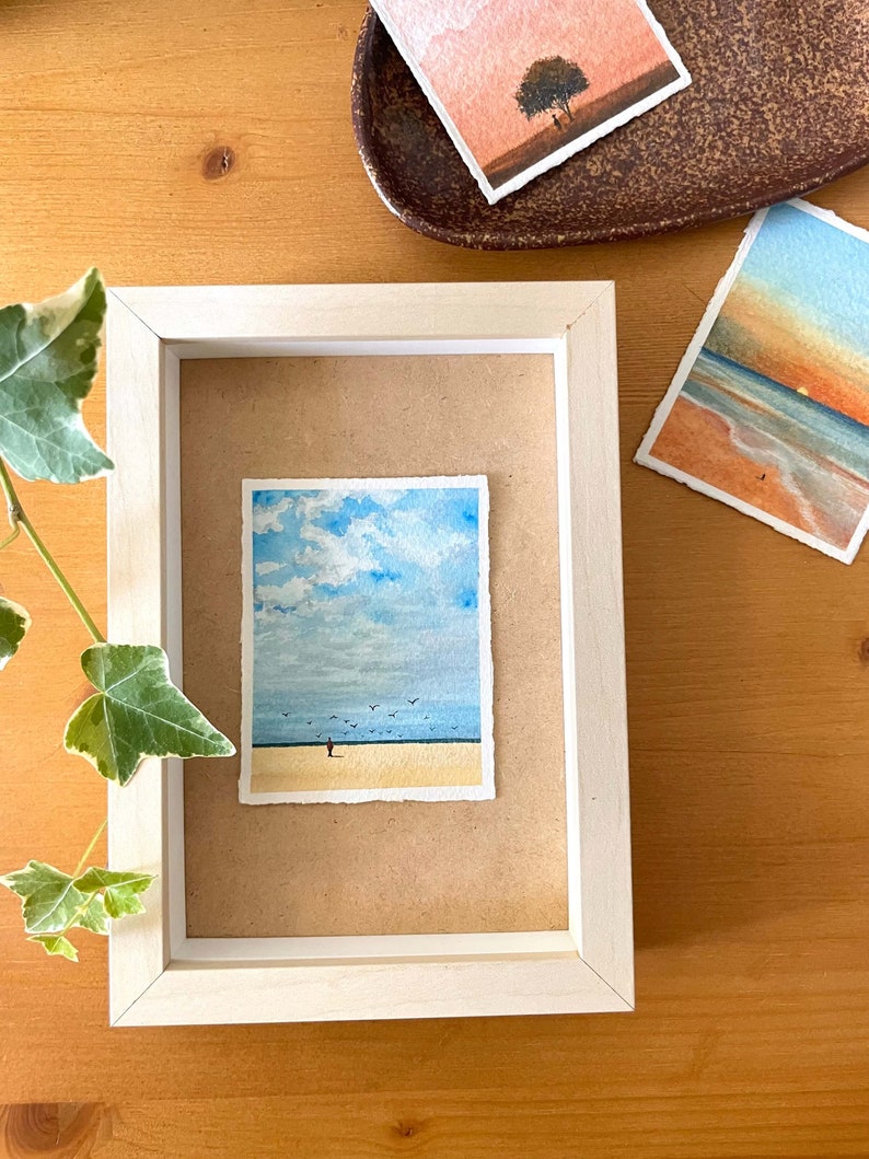 original mini watercolor painting about a lonely man on the beach