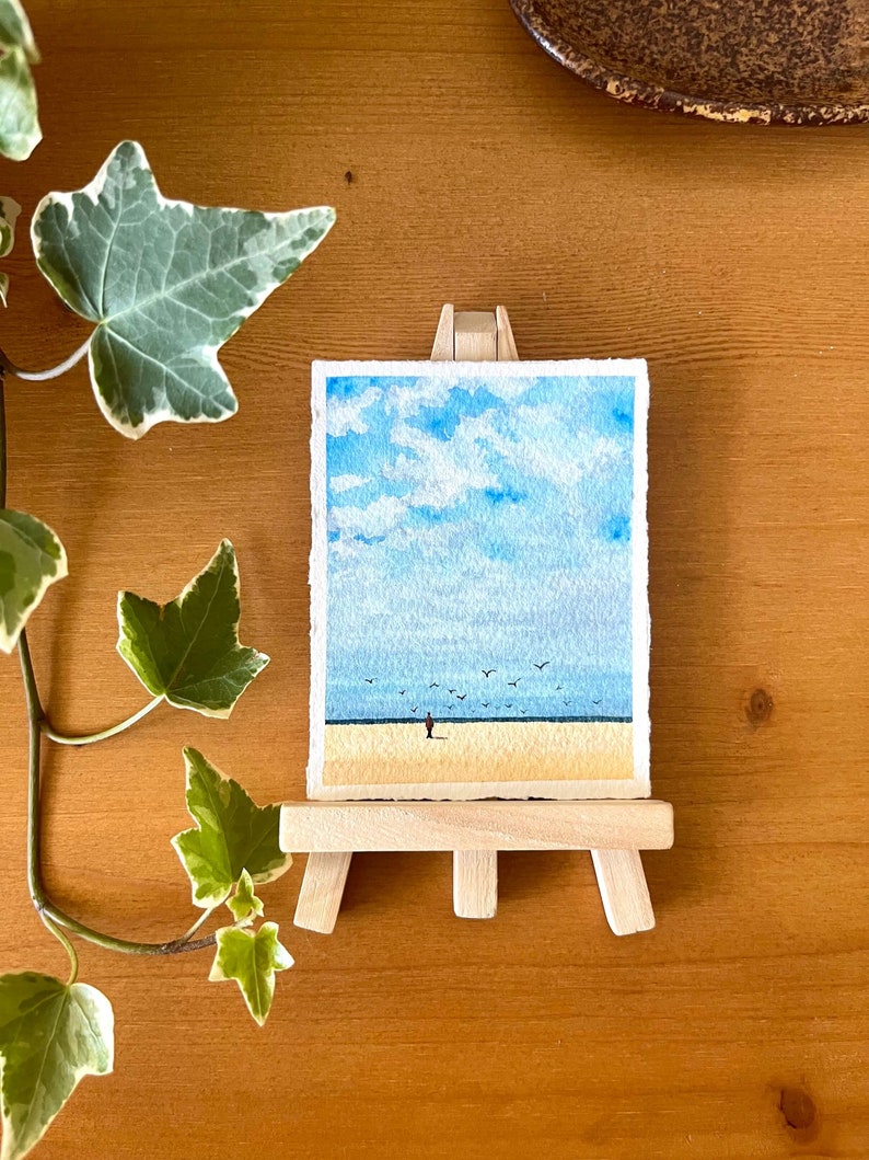 original mini watercolor painting about a lonely man on the beach