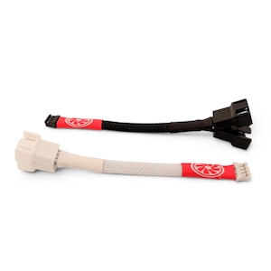 May include: Two computer fan extension cables. One cable is black, the other is white. Both have a red band with a fan logo. The black cable has a black connector, and the white cable has a white connector.