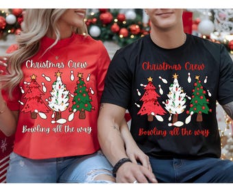May include: Red and black t-shirts with a Christmas theme. Each shirt features a design of three Christmas trees with bowling pins and the text "Christmas Crew" and "Bowling all the way".