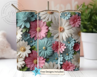 May include: Three stainless steel tumblers with a floral design. The tumblers feature a pattern of pink, white, and blue paper flowers. The tumblers are 20 ounces each.