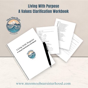 May include: A spiral-bound workbook titled "Living With Purpose: A Values Clarification Workbook" with the Moo Moo Bear logo. Several loose pages and a black pen are also visible. The background is a light beige.