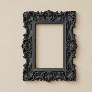 May include: A rectangular picture frame in a matte black finish, featuring an ornate, raised relief pattern of scrolling acanthus leaves and floral motifs along the entire border, surrounding a plain, light beige rectangular centre opening.