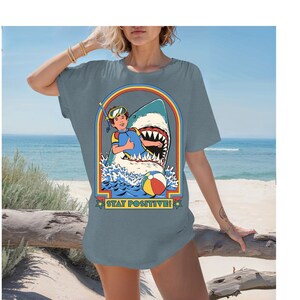 Stay Positive: Jaws Edition Cotton Tee ! Take a Bite out of Optimism