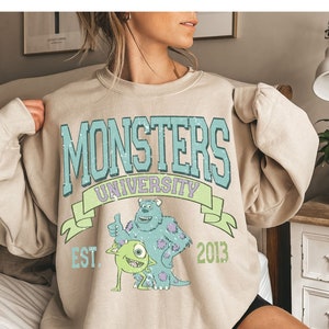 Monsters University Retro Vibes Crewneck: A Vintage Tale of Frights and Fun!