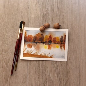 Alberi in autunno sul lago